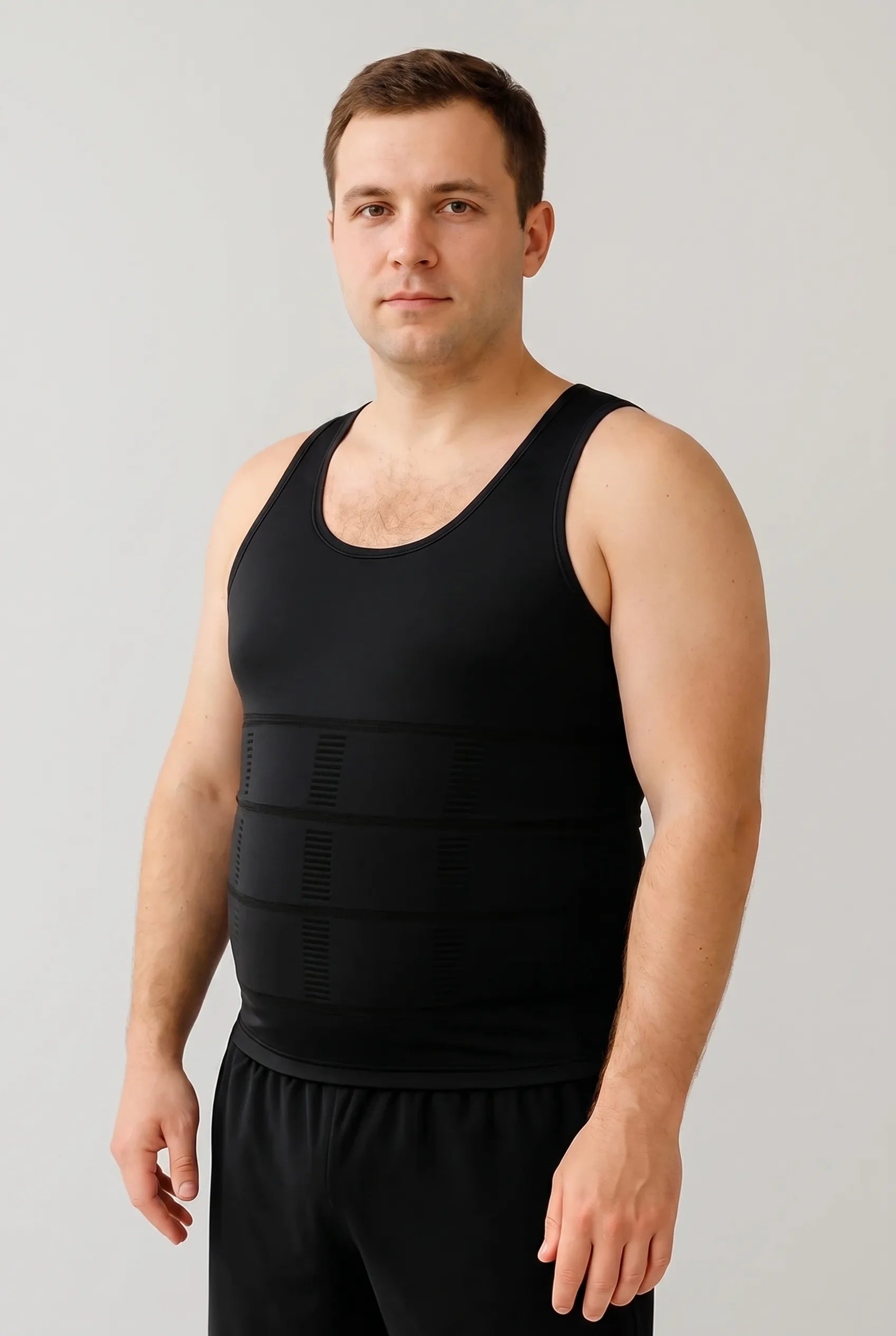 Homme portant le débardeur Fitcore